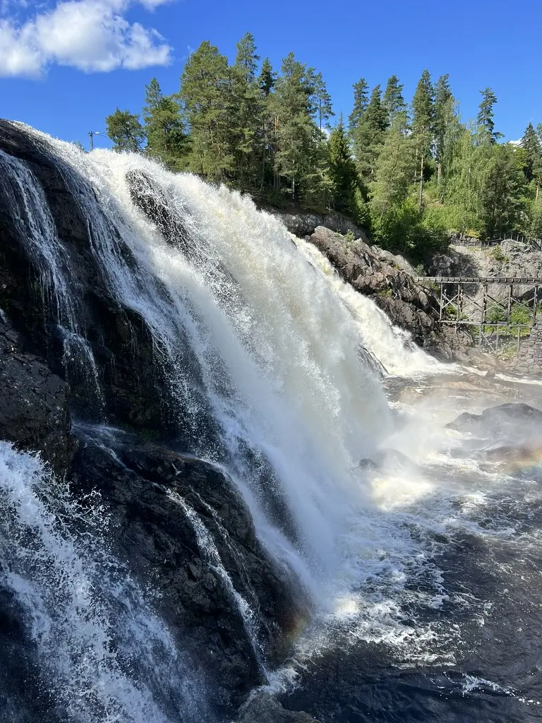 Nordic mountain waterfall representing reliable release and deployment delivery.